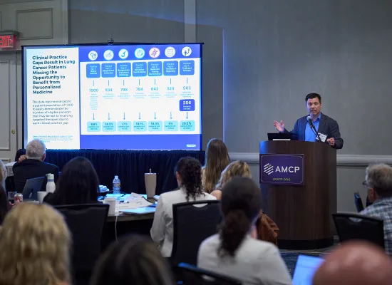 AMCP Staff speaking to room at conference