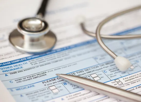 A medical bill with a stethescope